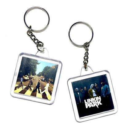 Custom NFC keychains with iconic album covers, perfect for music lovers to tap and play tracks on NFC-enabled devices.