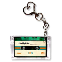 Mini Cassette NFC keychain with personalized label on a white background