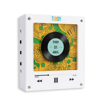 NFC fridge magnet player box with a transparent front panel showing a stylized vinyl record