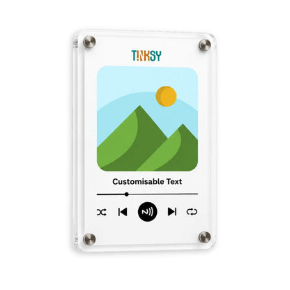 A clear acrylic picture magnetic frame with rounded corners and four silver metal screws, displaying a customizable music player style graphic with green mountains, a yellow sun, and the brand name 'TINKSY' at the top.